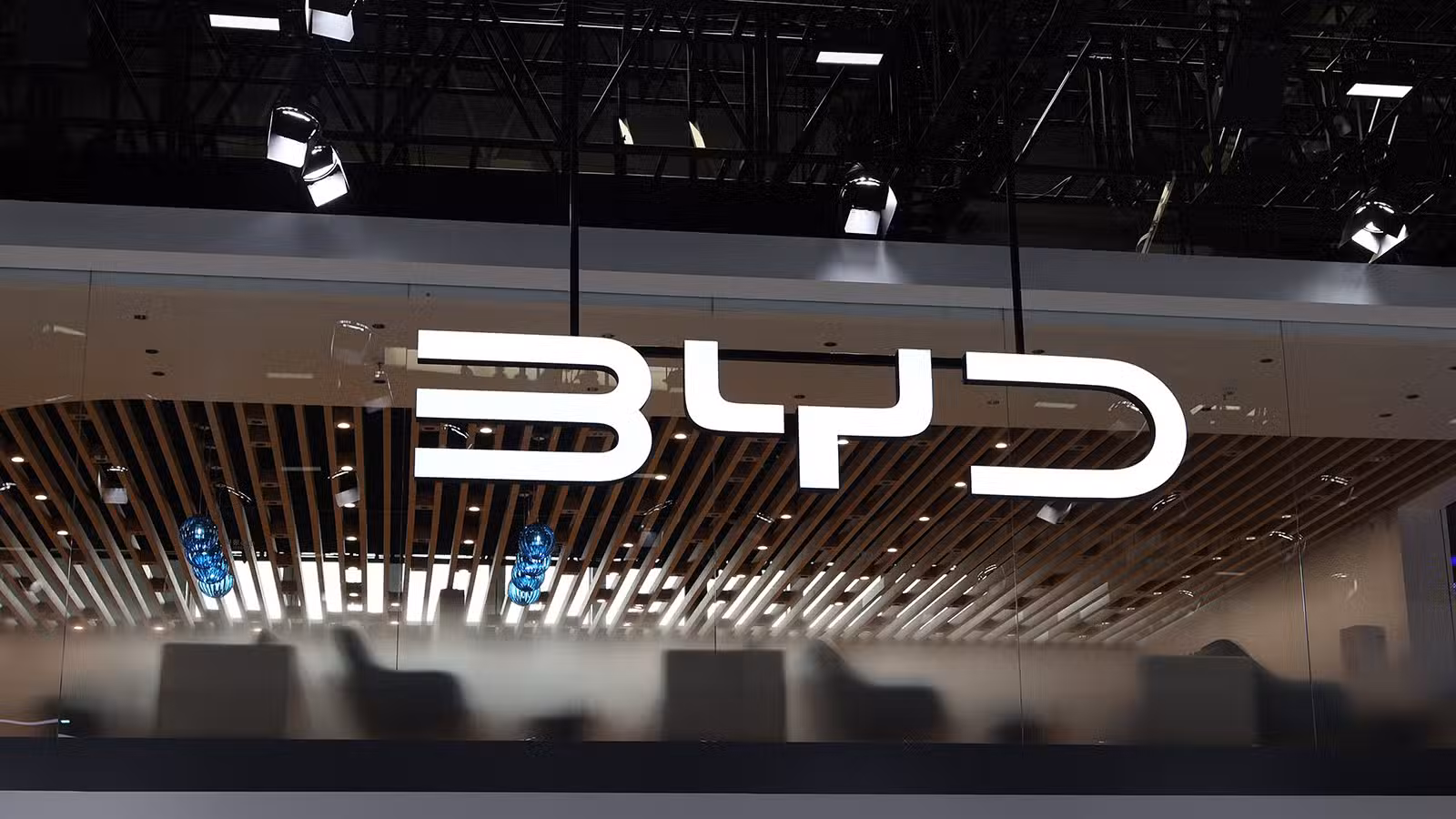 BYD refutes US military list designation, says business unaffected The BYD logo at the Beijing Auto Show venue in April 2026.
