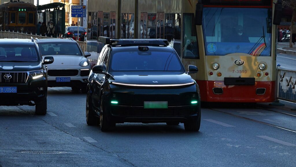 A file photo shows a Li L9 with its smart driving blue indicator light on.