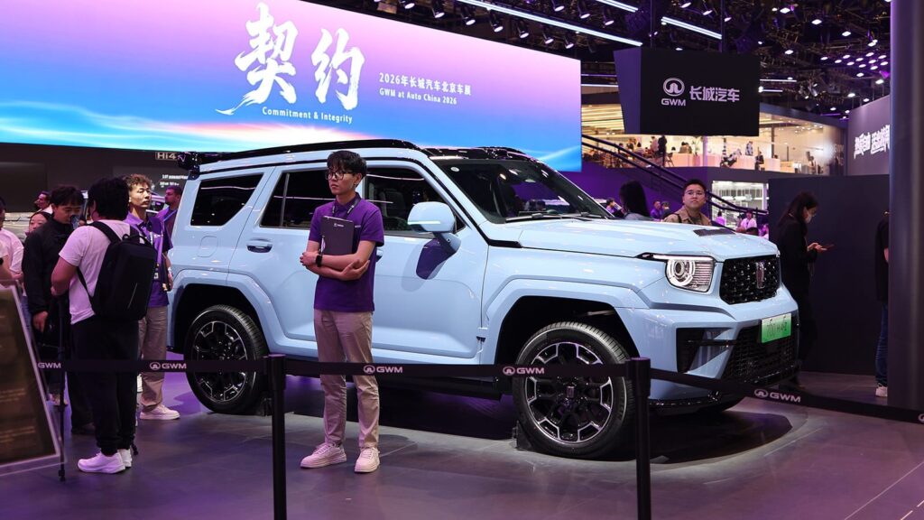 GWM flags sharp drop in H1 profit, to repurchase H shares A GWM SUV model on display at the Beijing Auto Show in April 2026.