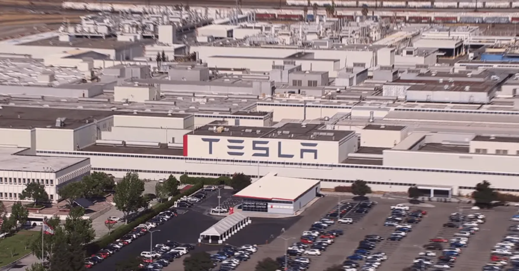Tesla partly settles racism lawsuit as hundreds of workers press on