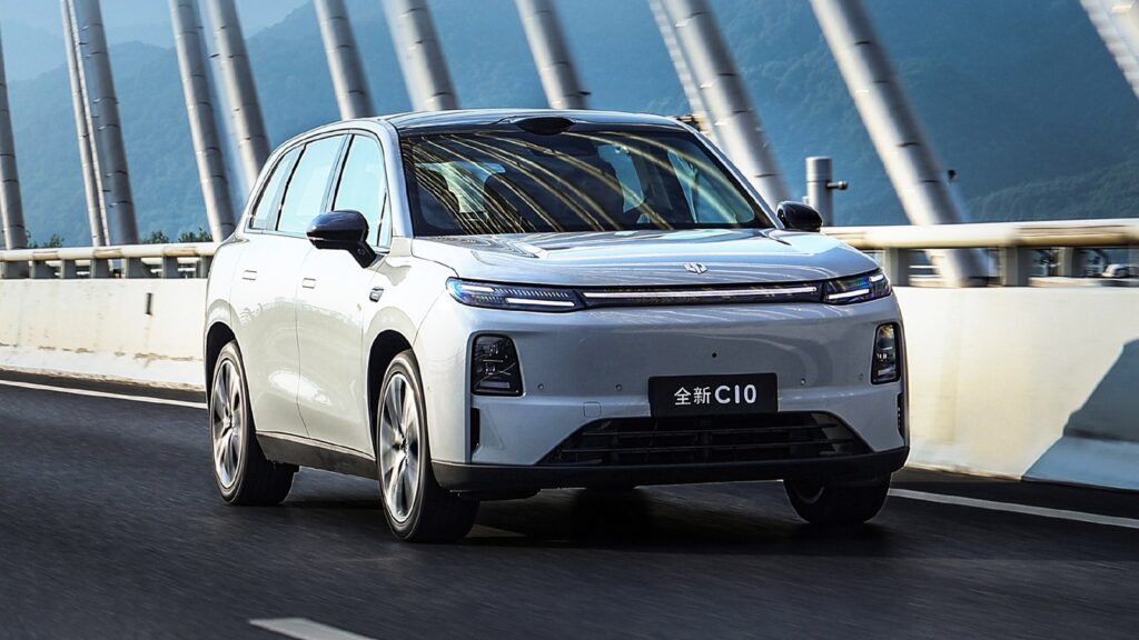 Leapmotor C10 SUV driving on a bridge, shown from the front three-quarter angle.