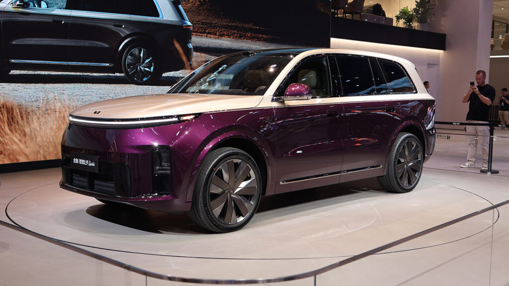 A purple-and-white Li L9 Livis SUV on display at the 2026 Beijing auto show.