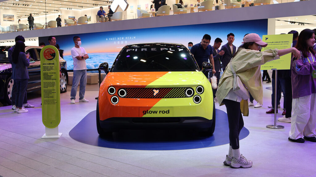 Nio Firefly teases new special-edition model for August 28 Front view of an orange-and-lime Firefly EV displayed at the 2026 Beijing Auto Show.