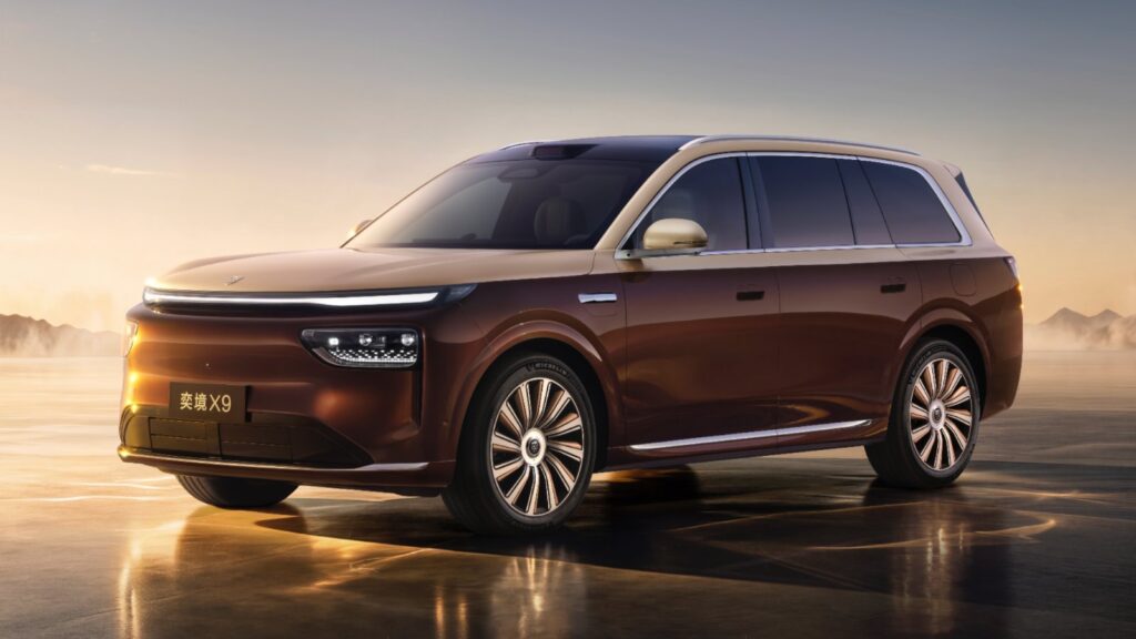 Dongfeng-Huawei brand Epicland launches X9, targeting large extended-range SUV market Front three-quarter view of a two-tone brown and gold Epicland X9 SUV with a full-width LED light strip and roof-mounted LiDAR.