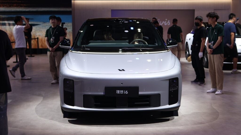 Front view of a silver Li i6 electric SUV on display at the Beijing Auto Show in April 2026.