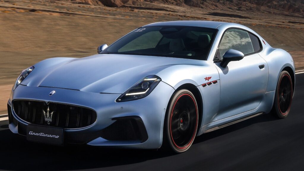 Maserati plans 2 EVs in revival push with Huawei and JAC, report says A light blue Maserati GranTurismo driving on a road, viewed from the front three-quarter angle.
