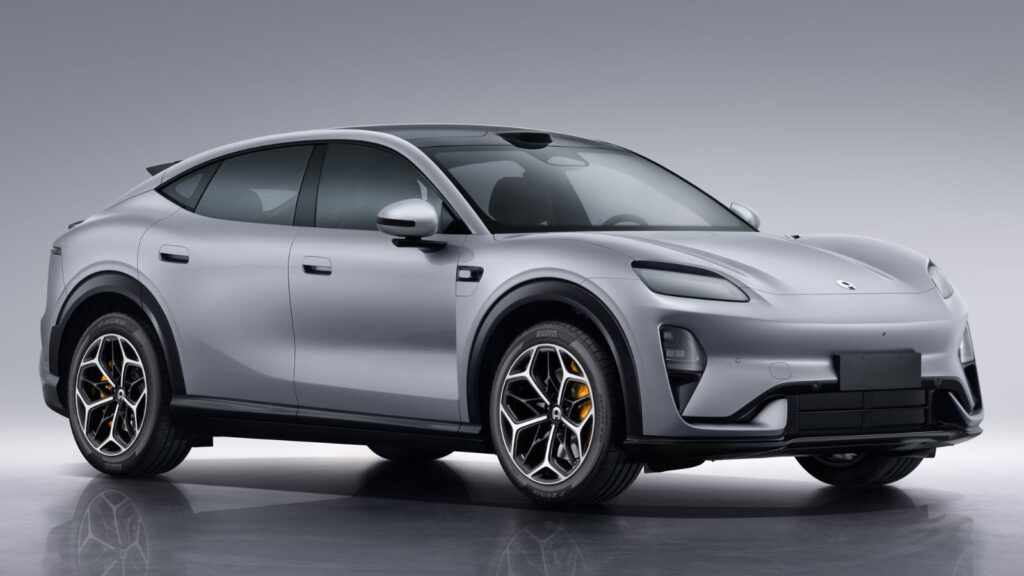 Silver Aiva ME7 electric SUV with a sloping roofline, black wheel arches and yellow brake calipers.