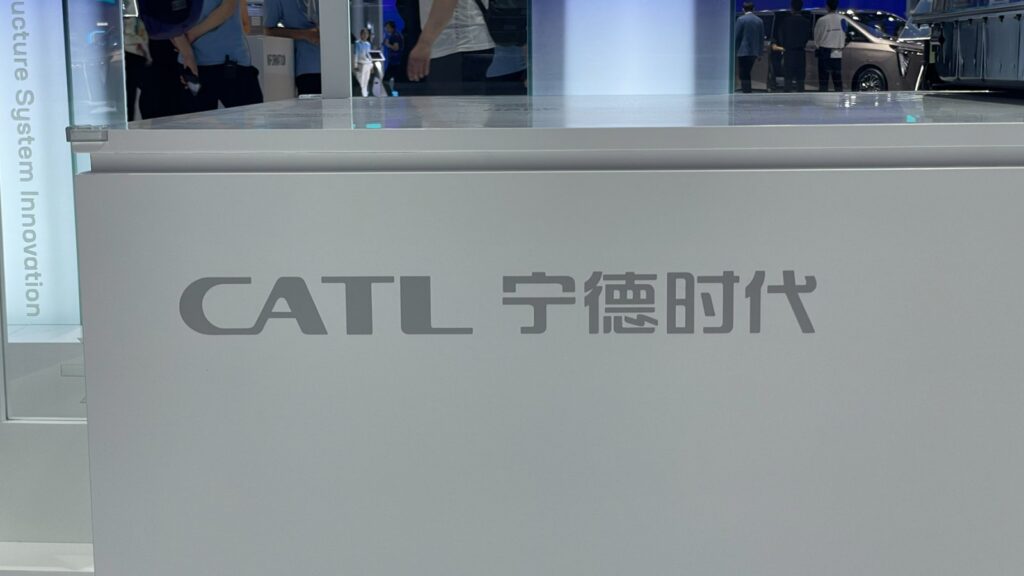 CATL logo and Chinese name on a white exhibition display.