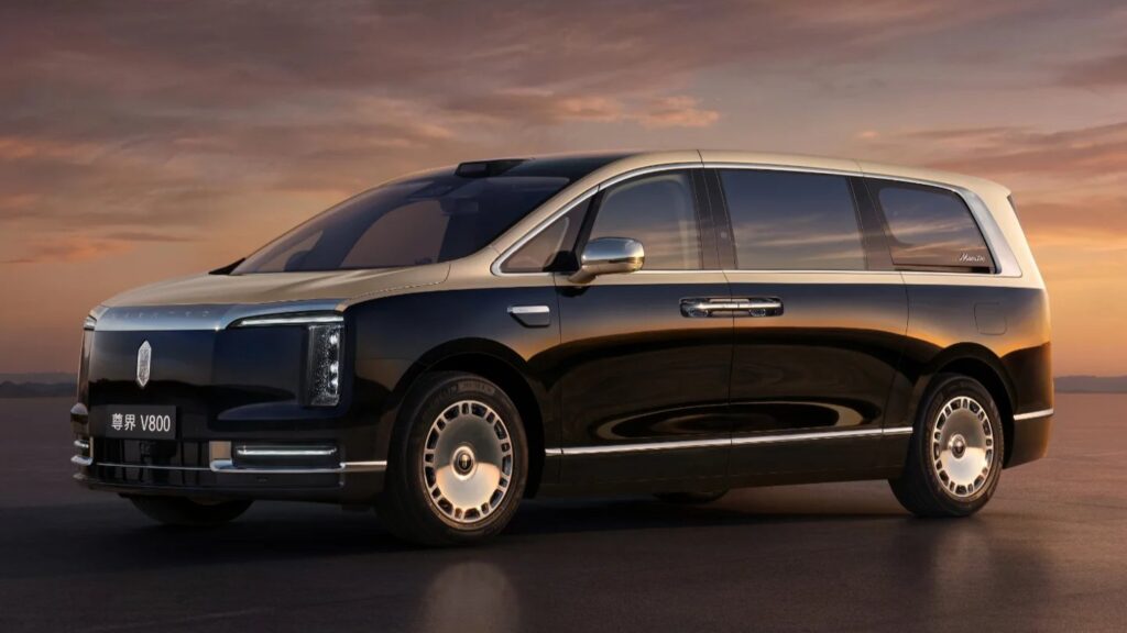A black-and-gold Maextro V800 MPV shown from the front and side at sunset.