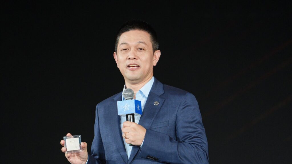 File photo shows William Li, founder, chairman, and CEO of Nio, demonstrating a Shenji autonomous driving chip developed in-house by Nio.