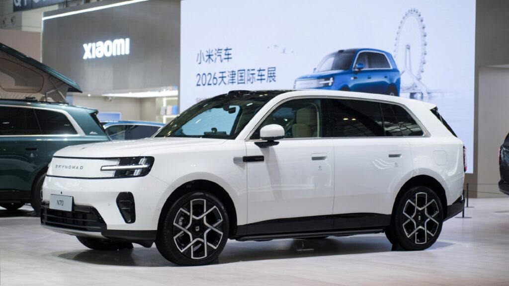 Xiaomi Sky Nomad tops 70,000 locked-in orders, bolstering EREV push White Xiaomi Sky Nomad N70 SUV displayed at the Tianjin auto show, viewed from the front three-quarter angle.